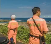  ?? LAM YIK FEI/THE NEW YORK TIMES ?? Members of Taiwan’s Coast Guard patrol Saturday on an island in the Taiwan Strait near an area where China was holding military drills.