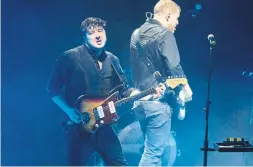  ?? OWEN SWEENEY INVISION/THE ASSOCIATED PRESS ?? Marcus Mumford, left, and Ted Dwane of the band Mumford &amp; Sons kicked off the North American leg of their Delta Tour, which includes two Toronto shows.