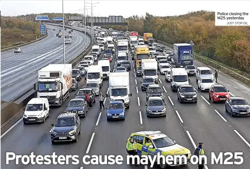  ?? JUST STOP OIL ?? Police closing the M25 yesterday