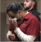  ?? CARL HESSLER JR. — MEDIANEWS GROUP ?? Admitted serial burglar Leroy Boose, of Upper Darby, is escorted from court to begin serving 15-to30-year prison term.