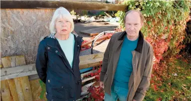  ?? ?? Ian Williamson, right, and wife Patricia are residents concerned by all the building waste at the former Farmers Boy pub. Ref:134963-10