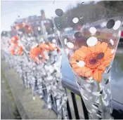  ??  ?? Floral tributes left outside the pub