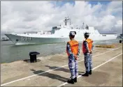  ?? WU DENGFENG/XINHUA NEWS AGENCY VIA AP ?? IN THIS PHOTO RELEASED BY CHINA’S Xinhua News Agency earlier this month, a ship carrying Chinese military personnel departs a port in Zhanjiang, south China’s Guangdong Province.