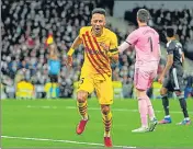  ?? ?? Barcelona’s Pierre-Emerick Aubameyang celebrates after scoring his side’s fourth goal against Real Madrid on Sunday.