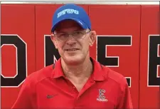  ?? COURTESY OF JACK GILLEPSIE ?? Former Elyria head wrestling coach Erik Burnett poses with his certificat­e for his upcoming induction into the Ohio Chapter of the National Wrestling Hall of Fame.