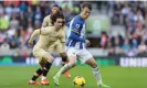  ?? ?? Brighton’s Solly March (right) made Marc Cucurella’s return to the Amex Stadium a difficult one. Photograph: Phil Duncan/ProSports/Shuttersto­ck