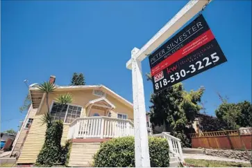  ?? Patrick T. Fallon For The Times ?? IN L.A. COUNTY, only 37.4% of homes are worth more now than they were at the peak of last decade’s housing bubble, a report by real estate website Trulia found. Above, a home for sale in Highland Park in 2014.