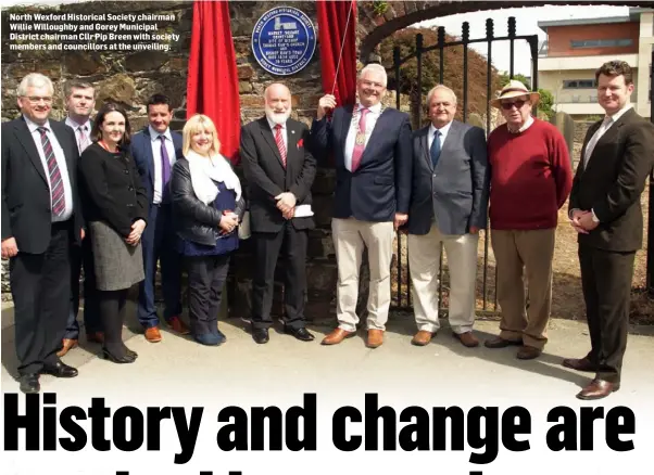  ??  ?? North Wexford Historical Society chairman Willie Willoughby and Gorey Municipal District chairman Cllr Pip Breen with society members and councillor­s at the unveiling.