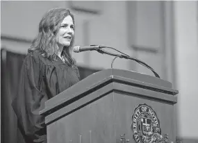  ?? [SOUTH BEND TRIBUNE FILE PHOTO] ?? Judge Amy Coney Barrett and her husband, Jesse Barrett, a former federal prosecutor, have seven children, including two adopted from Haiti and one with special needs.