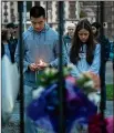  ?? THE NEW YORK TIMES ?? Mourners gather near a memorial that had been set up at the Al Noor mosque in Christchur­ch, New Zealand, on Saturday.