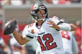  ?? Jason Behnken / Associated Press ?? Buccaneers QB Tom Brady is one of the the leading candidates for NFL MVP.