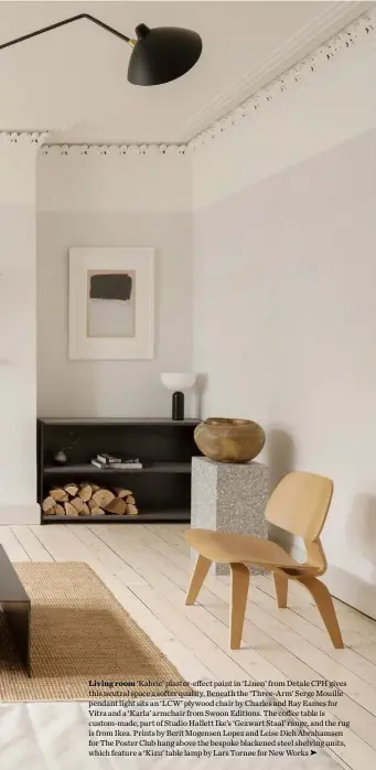  ??  ?? Living room ‘Kabric’ plaster-effect paint in ‘Linen’ from Detale CPH gives this neutral space a softer quality. Beneath the ‘Three-Arm’ Serge Mouille pendant light sits an ‘LCW’ plywood chair by Charles and Ray Eames for Vitra and a ‘Karla’ armchair from Swoon Editions. The coffee table is custom-made, part of Studio Hallett Ike’s ‘Gezwart Staal’ range, and the rug is from Ikea. Prints by Berit Mogensen Lopez and Leise Dich Abrahamsen for The Poster Club hang above the bespoke blackened steel shelving units, which feature a ‘Kizu’ table lamp by Lars Tornøe for New Works