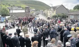  ?? Peter Bolter ?? > A service of commemorat­ion was held in Nantymoel, near Bridgend, yesterday, for Cpl James Llewellyn Davies