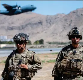  ??  ?? PAINFUL RETREAT: US 82nd Airborne Division troops at Kabul airport