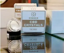  ??  ?? Crystals containing CBD ( Cannabidio­l) are seen in a shop.– AFP