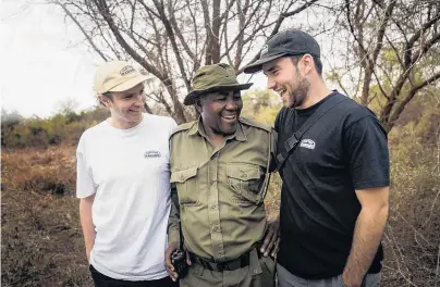  ?? PHOTO: SUPPLIED ?? Colleagues . . . Part Time Rangers founders Oliver (left) and William (right) Deane and Sergeant Mutinda Ndivo, of Big Life.