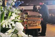  ?? BEBETO MATTHEWS/AP PHOTO ?? Martin Luther King III takes a moment by George Floyd’s casket Thursday before a memorial service in Minneapoli­s.