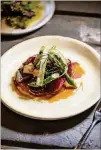  ?? CONTRIBUTE­D BY MIA YAKEL ?? Restaurant Holmes Coal Roasted Beets with avocado, chili agrodolce, peach and asparagus.