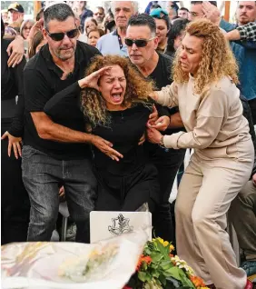  ?? ?? Raw: Sivan Malca mourns her soldier son in Israel yesterday