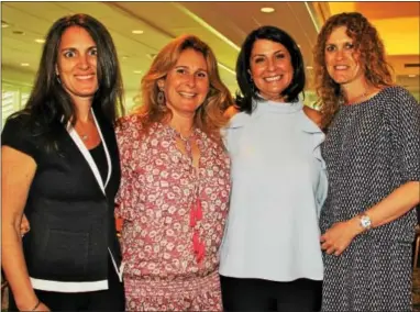  ??  ?? Sarah Bernstein of Gladwyne, Lori Axelrod of Merion, Lori Aronsky of Bryn Mawr and Beth Krouse of Penn Valley head to the boutique tables before the luncheon begins.