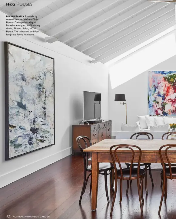  ??  ?? DINING/FAMILY Artworks by Aaron Kinnane (left) and Todd Hunter. Dining table, Miguel Meirelles Antiques. No.18 dining chairs, Thonet. Sofas, MCM House. The sideboard and floor lamps are family heirlooms.