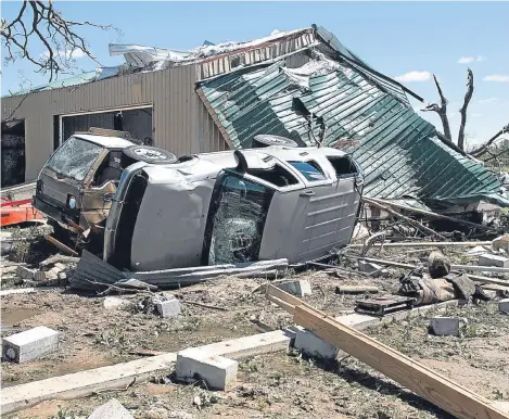  ??  ?? AT least 14 people have been killed in severe storms rolling across the US.
Tornadoes hit several small towns in East Texas, killing four people. Five people were killed by flooding and winds in Arkansas, including a fire chief who was struck by a...