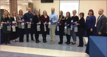  ?? EVAN BRANDT — MEDIANEWS GROUP ?? 13Pottstow­n School District teachers are recognized for having fostered three or more years of consistent test score growth in their classrooms during the Jan. 16school board meeting.