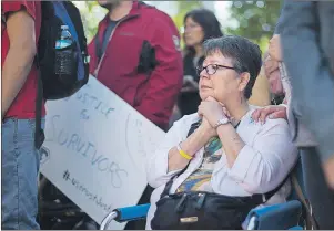  ?? CP PHOTO ?? Sixties Scoop survivor Dokis Thibault is emotional as she gathers with supporters at a rally in Toronto Tuesday ahead of a landmark court hearing on the so-called ‘60s Scoop.