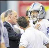  ?? AP ?? Cowboys quarterbac­k Tony Romo left Thursday’s game at Seattle after taking a hit from behind on the third play. Romo and the team said afterward he was fine.