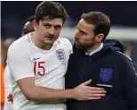  ??  ?? Dropped: Maguire with Southgate