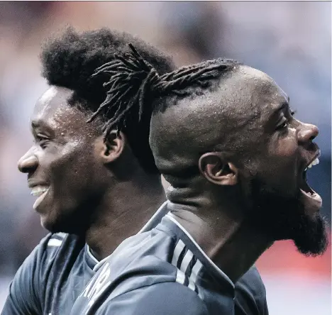  ?? THE CANADIAN PRESS/DARRYL DYCK ?? Kei Kamara, right, is the lone million-dollar man on the Caps’ roster; Alphonso Davies, left, earns $72,500.