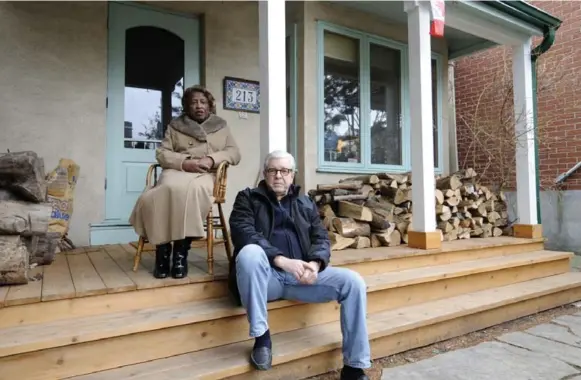  ?? AARON HARRIS FOR THE TORONTO STAR ?? Faith Jackson, widow of Albert Jackson’s grandson, raised her family in Jackson’s Harbord Village home. Patrick Crean now lives there and has asked the city to name a lane for the postman.