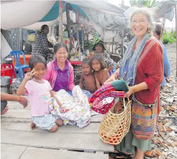  ?? ELOISE FILET ?? When Eloise Charet returned to Cambodia in 2012 to give away some quilts, it was a different country from the one she escaped with her sister and 55 orphans during the Khmer Rouge takeover in the 1970s.