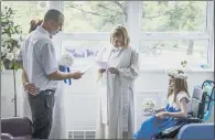  ?? PICTURES: PA ?? Kayleigh was allowed out of hospital to walk her mother down the aisle, before a reception and blessing on her ward. BRIDESMAID: