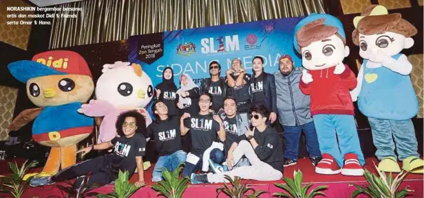  ??  ?? NORASHIKIN bergambar bersama artis dan maskot Didi & Friends serta Omar & Hana.