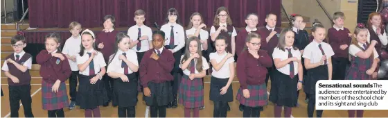  ??  ?? Sensationa­l sounds The audience were entertaine­d by members of the school choir and its sight and sing club