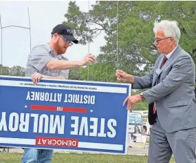  ?? LUCAS FINTONE/THE COMMERCIAL APPEAL ?? Steve Mulroy, right, will face incumbent Shelby County District Attorney General Amy Weirich in the August election after winning Tuesday’s Democratic primary against two opponents.