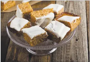  ?? GETTY IMAGES ?? An easy pumpkin cake iced with marshmallo­w frosting is just the ticket for fall feasts.