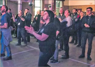  ??  ?? The crowd dance along in Carradale Village Hall.