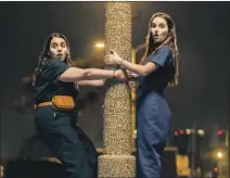  ?? Francois Duhamel Annapurna Pictures ?? MOLLY (Beanie Feldstein, left) and Amy (Kaitlyn Dever) have adventures in “Booksmart.” Molly’s trouble is her personalit­y.