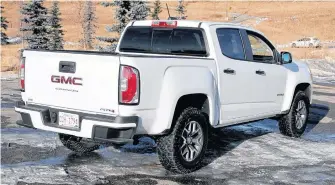  ?? BRENDAN MILLER • POSTMEDIA NEWS ?? The GMC Canyon AT4 is available as an extended crew cab with a six-foot bed or a four-door crew cab with either a shorter five-foot box, like this one, or longer six-foot box.