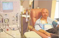  ?? GRETCHEN HOLLIFIELD/NEWS SENTINEL ?? Desert Storm veteran Junior Hollifield, 48, shown Saturday undergoing dialysis, is scheduled to receive a kidney today from a donor who did not know him.