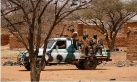  ?? Photograph: Luc Gnago/Reuters ?? Government soldiers in the village of Gorgadji in northern Burkina Faso.