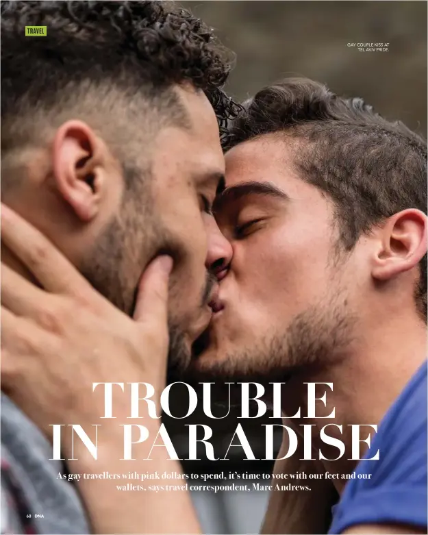  ??  ?? GAY COUPLE KISS AT TEL AVIV PRIDE.