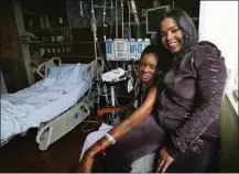  ?? CONTRIBUTE­D BY NANCY STONE/ CHICAGO TRIBUNE/ TNS ?? Tammika “Niki” Glass, 37, left, and Karen Tompkins, 52, photograph­ed in 2015, became “heart sisters” at Northweste­rn Medical Center in Chicago, where they both waited for heart transplant­s.