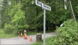  ?? PHOTOS BY TANIA BARRICKLO — DAILY FREEMAN FILE ?? The blocked entrance to the Big Deep swimming hole in Woodstock, N.Y., is shown on May 28.