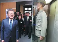  ?? YONHAP NEWS AGENCY ?? Republic of Korea’s President Moon Jae-in visits the history exhibit at the Museum of the Provisiona­l Government of the Republic of Korea in Chongqing on Saturday.