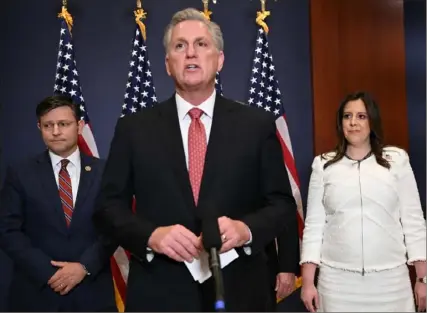  ?? Mandel Ngan/AFP via Getty Images ?? House Minority Leader Kevin McCarthy, a Republican from California, center, has been an outspoken opponent of mask mandates. He is seen speaking a news conference in May with Rep. Mike Johnson, R-La., and Rep. Elise Stefanik, R-N.Y.