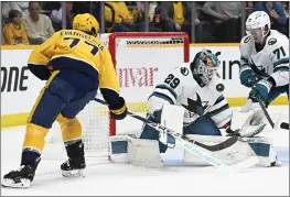  ?? MARK ZALESKI — THE ASSOCIATED PRESS, FILE ?? Sharks goaltender Mackenzie Blackwood (29) blocks a shot by Predators right wing Luke Evangelist­a (77) during the second period on Oct. 21in Nashville.