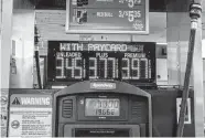  ?? Jutharat Pinyodoony­achet/New York Times ?? While prices at the pump aren’t nearly as high now, costs affect other facets of life and financial habits.